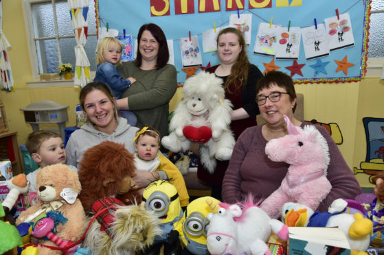 Pictured at the Toy Bank launch at the Banff Harvest Centre last year are, from the left, Naomi Earsman with children Cooper and Piper, Jillian McBain with Emmy, Katie Laing and Marion Martin, Harvest Centre administrator