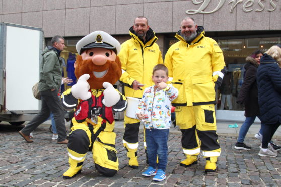 Members of the Peterhead RNLI team and mascot Stormy Stan met attendees