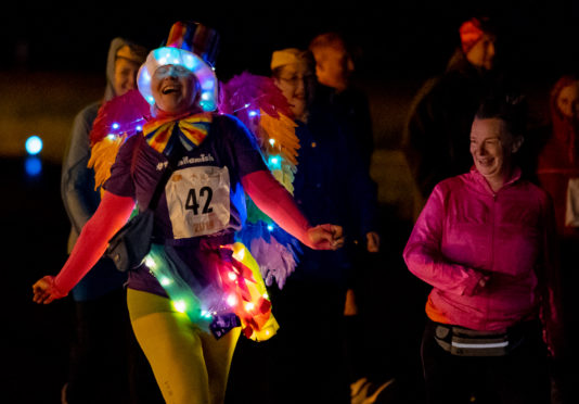Amanda Galletch illuminates all around her at Run the Runway event.
