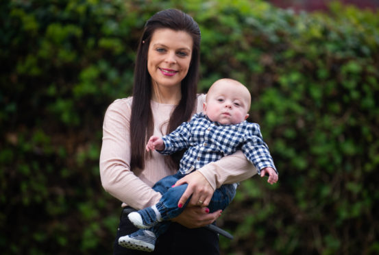 Proud mum Sarah Lawson with son Harry Smart.