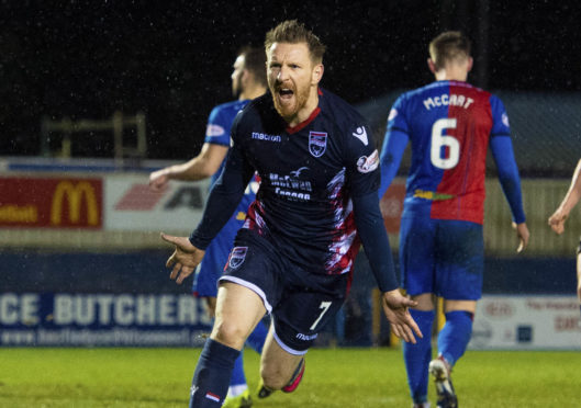 Michael Gardyne scores for Ross County against Inverness.