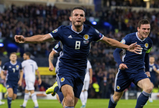 John McGinn in action for Scotland