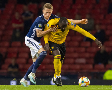 Scotland's Scott McTominay (left) battles with former Manchester United team-mate Romelu Lukaku