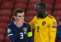 Scotland's Andy Robertson is consoled by Romelu Lukaku at full time