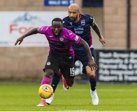 Ross County's Liam Fontaine (right)