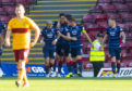 MOTHERWELL, SCOTLAND - SEPTEMBER 21: Ross County's Brian Graham celebrates his equaliser with teammates during the Ladbrokes Premiership match between Motherwell and Ross County at Fir Park on September 21, 2019, in Motherwell, Scotland (Photo by Craig Foy/SNS Group)