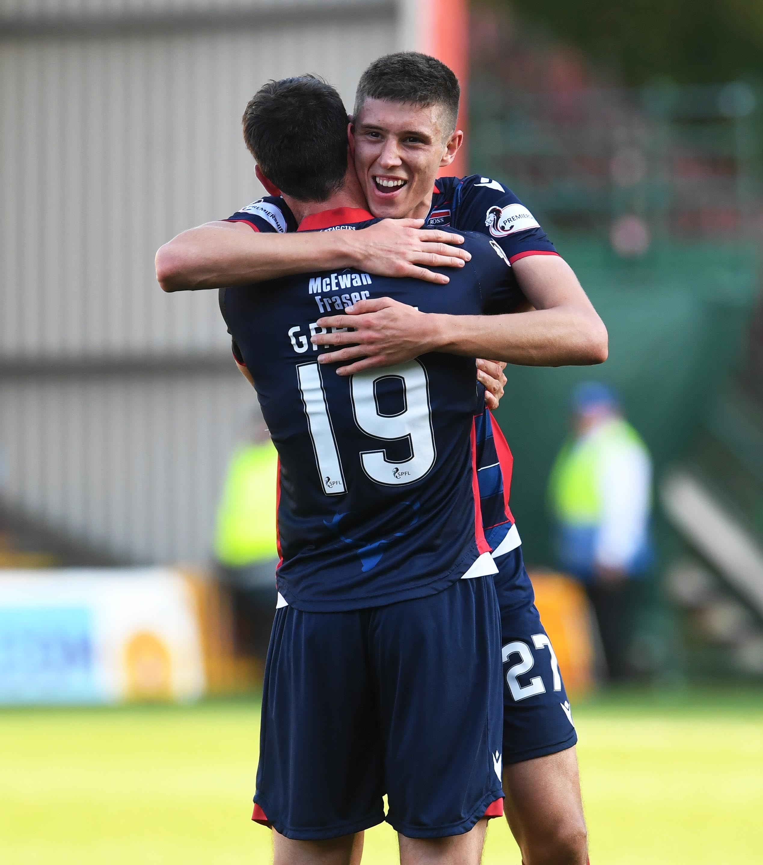 Ross Stewart celebrates with Ross County team-mate Brian Graham.
