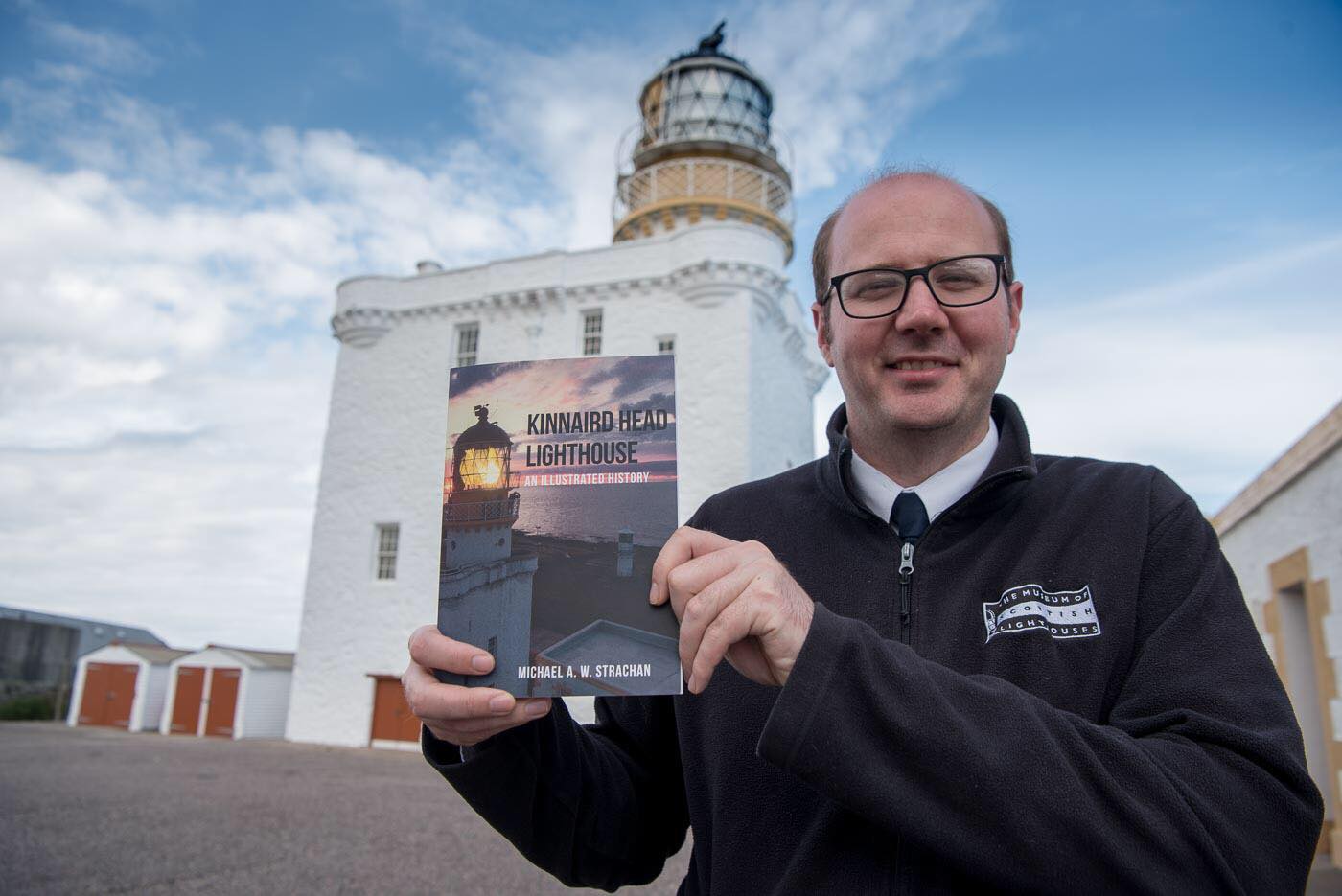 Micheal Strachan with his book ahead of the launch this Sunday - picture by Billy Watson