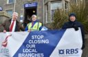 The RBS at Ellon Road, Bridge of Don - MSP Lewis Macdonald with Donna Clark and John McKay. See closure story.
Picture by COLIN RENNIE February 23, 2018.