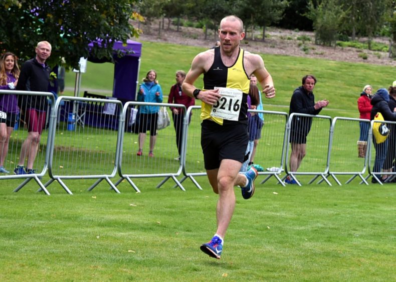 The winner of the 5K race, Kyle Greig. 
Picture by Jim Irvine