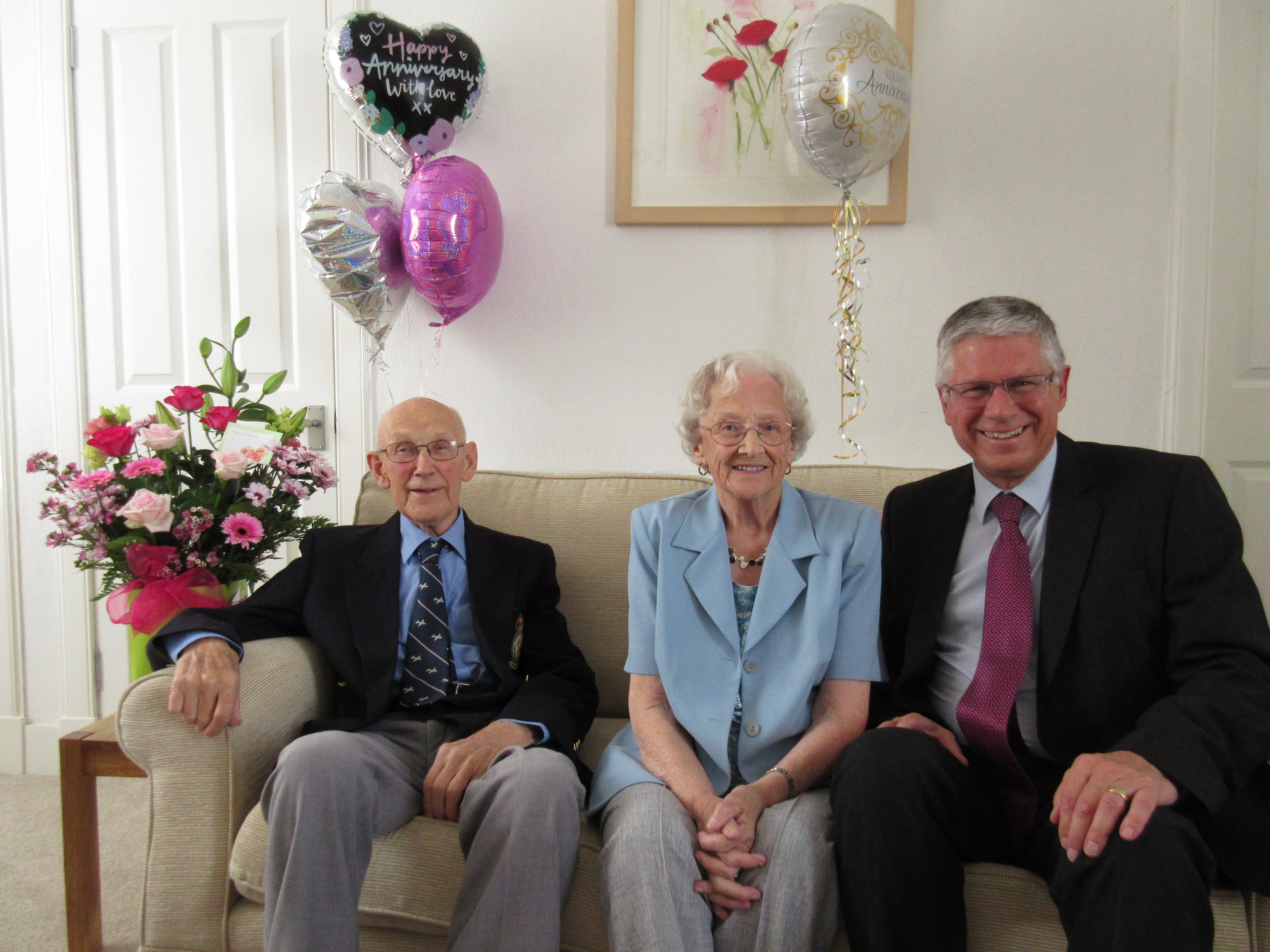 Chrissie (aged 92) and Charlie Murray (aged 94) of Banff with Andrew Simpson (Lord Lieutenant of Banffshire).