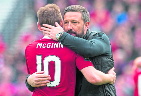 Aberdeen manager Derek McInnes embraces Niall McGinn.