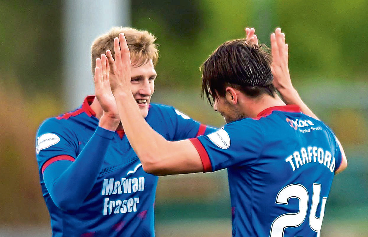 Charlie Trafford (R) celebrates his goal to make it 2-0 with Coll Donaldson