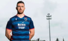 30/05/19
THE GLOBAL ENERGY ARENA - DINGWALL
Ross County's Ross Draper models the clubs new 2019/2020 home kit.