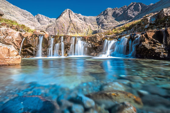 fav
Turquoise pools, also called Fairy Pools,  in Isle of Skye, Scotland.
