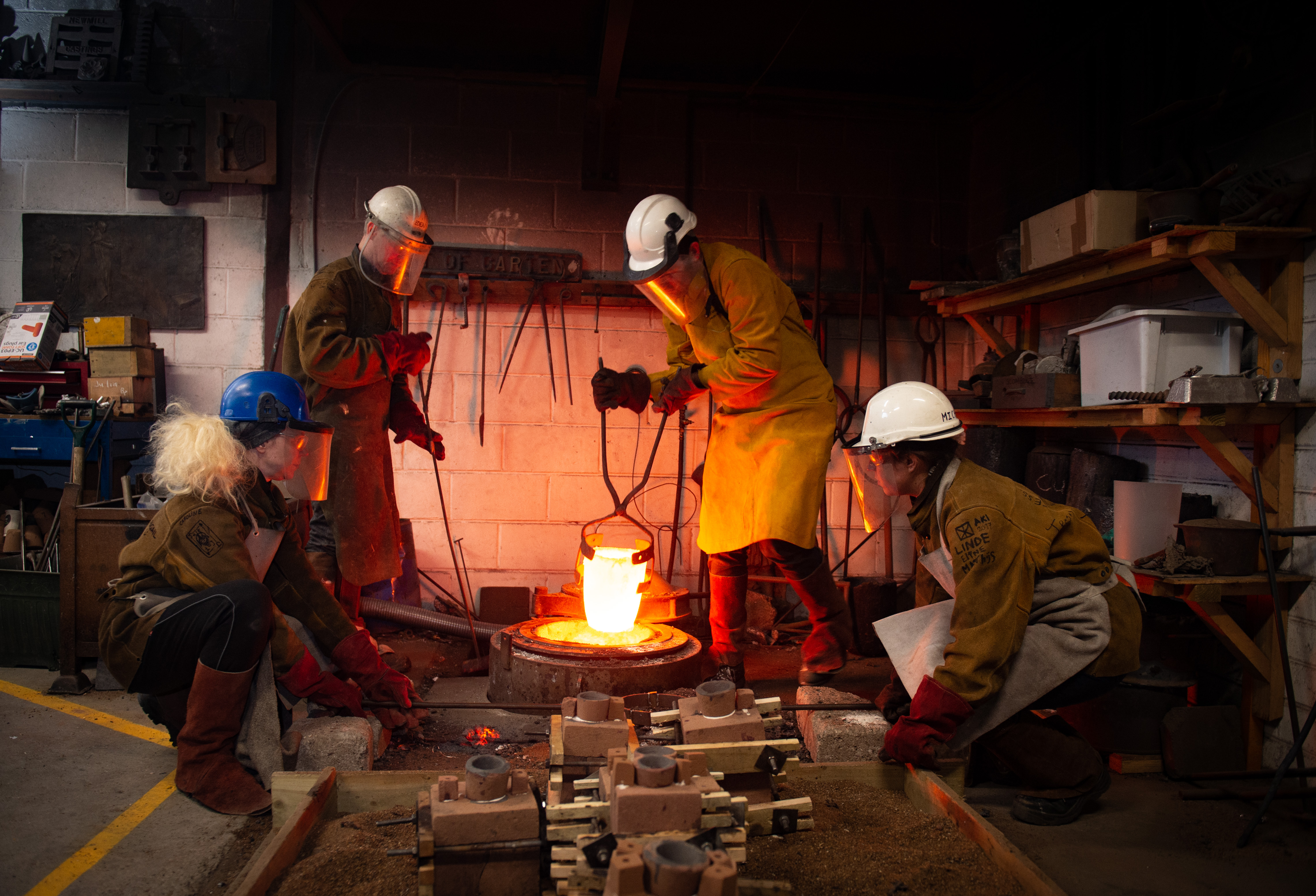 Pictures by JASON HEDGES
With the approach of Scottish Sculpture Workshop's 40th anniversary in Lumsden, artists fill moulds with molten bronze
