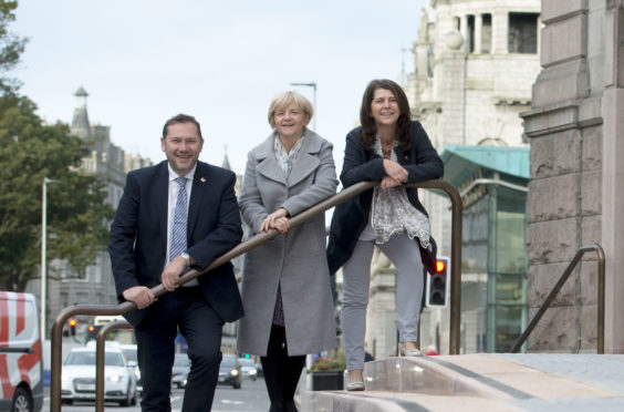 Councillor Jenny Laing, Councillor Douglas Lumsden, Councillor Marie Boulton outside the Aberdeen Art Gallery.