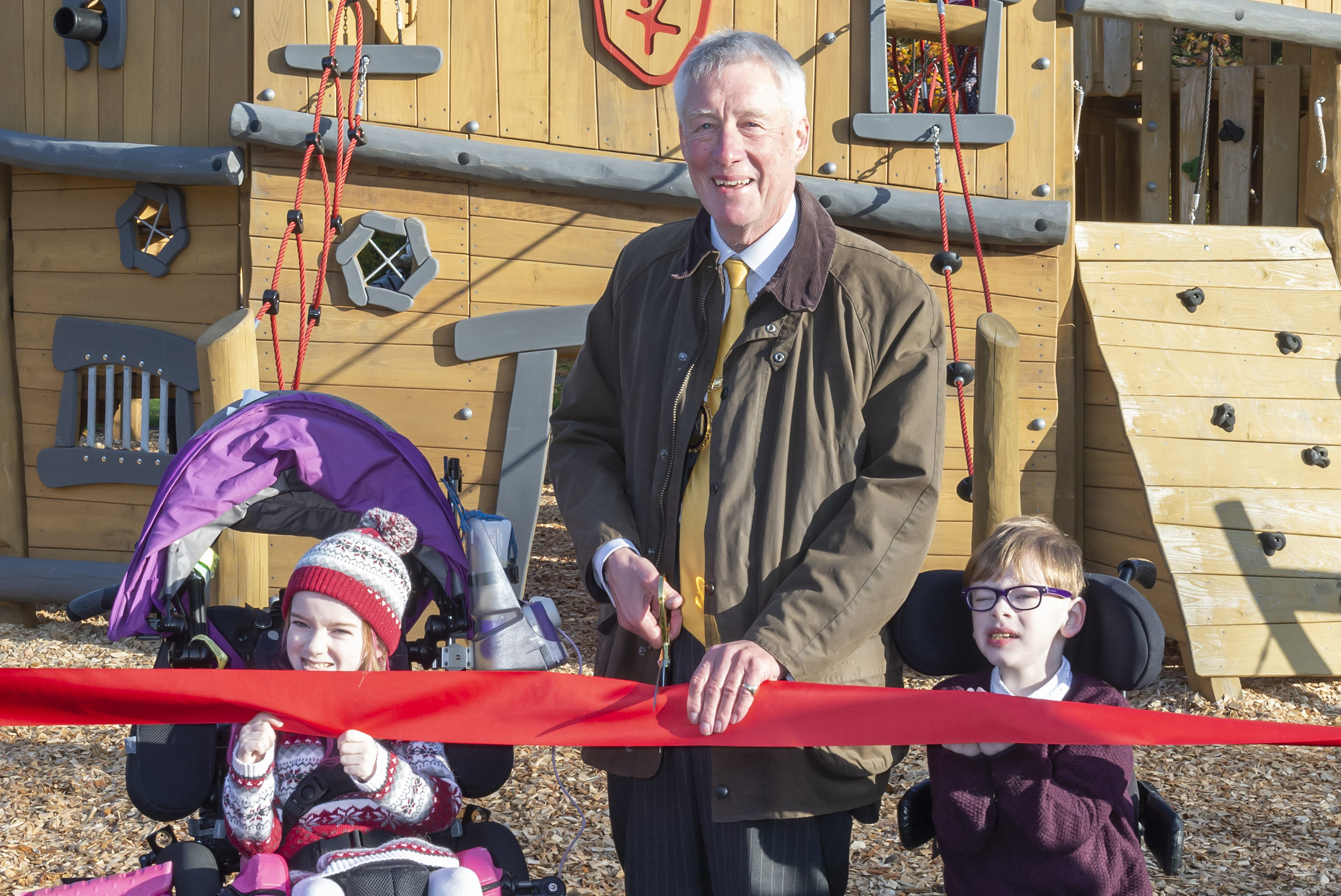 Iona and Findlay James-Bruce with Provost Bill Howatson at the Aden Country Park playpark opening.