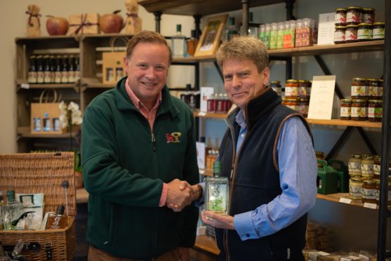 Angus Gordon Lennox, owner of Gordon Castle, and Mark Bilsby, chief executive of the Atlantic Salmon Trust.