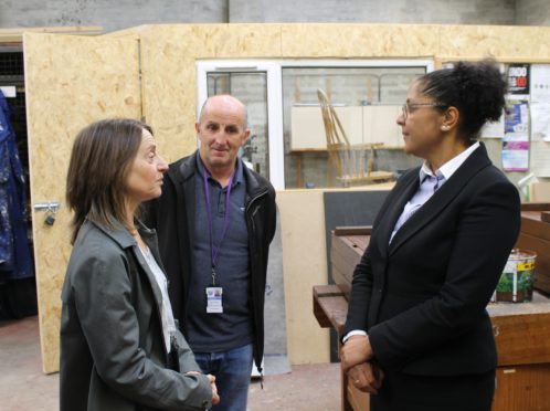 Sheriff Olga Pasportnikov, pictured right, speaks to Tish Richford and Peter Wilson from Moray Council's criminal justice team.