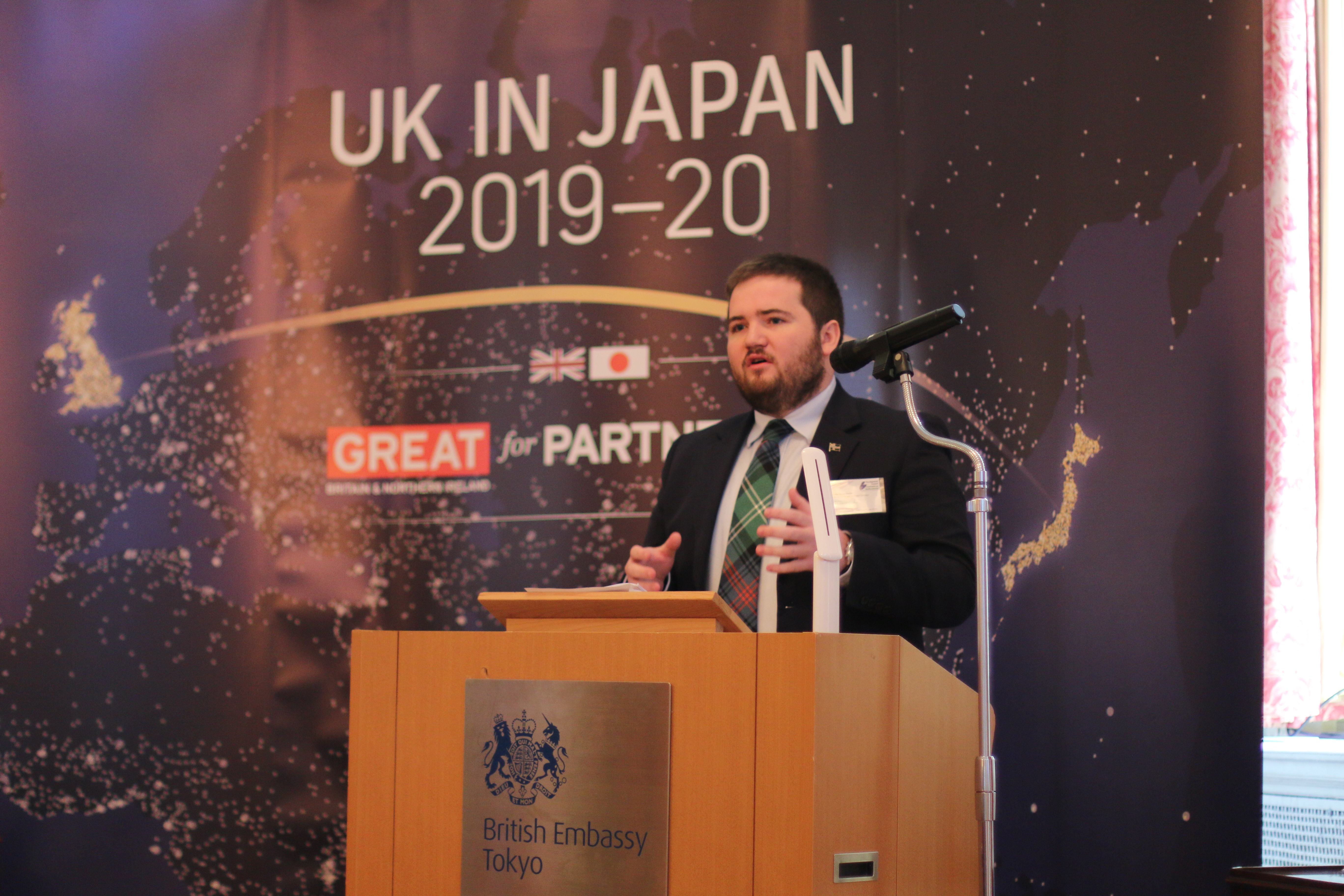 Councillor Struan Mackie delivering a speech at the British Embassy in Tokyo