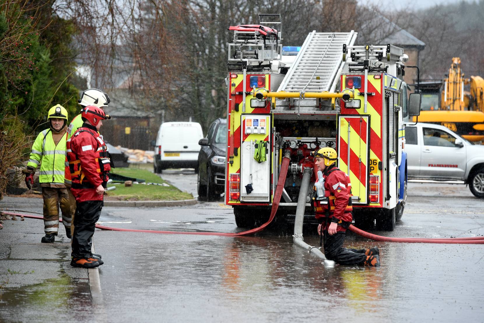 Flooding in Ballater. Fire fighters try to unblock the drains at the caravan park.