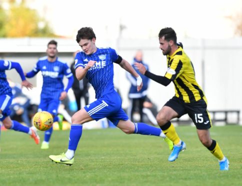 Peterhead's Ben Armour, left