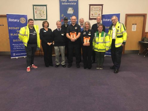 Members of Blackburn Rotary Club, volunteers and residents