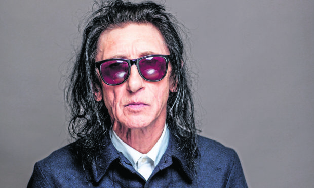 Dr John Cooper Clarke