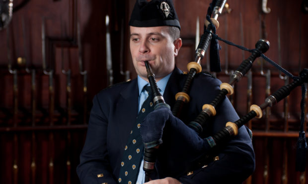 Finlay Johnston clinched victory at the 46th Glenfiddich Piping Championship