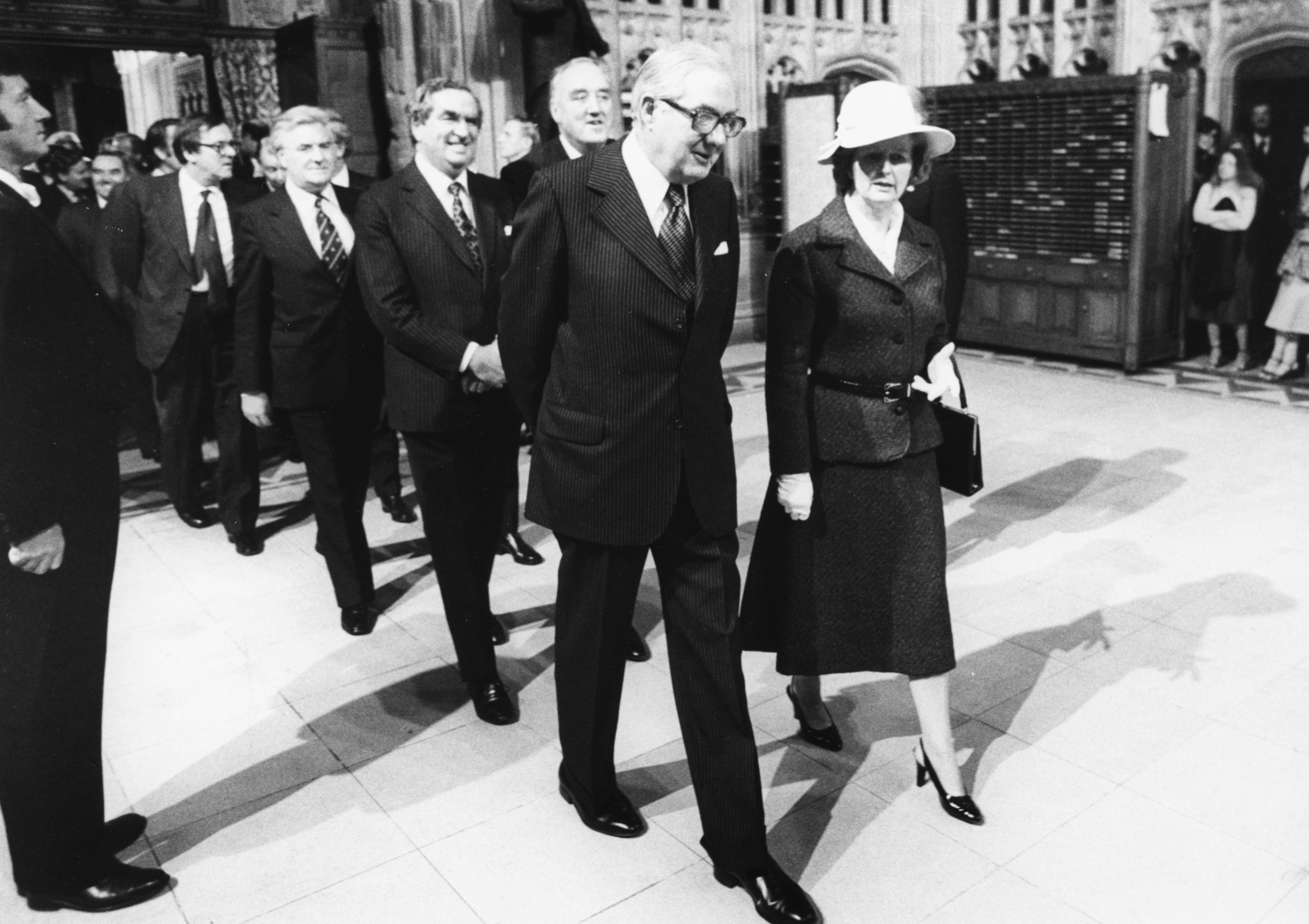Prime Minister James Callaghan and Leader of the Opposition Margaret Thatcher, followed by Denis Healey and William Whitelaw, engaged in conversation as they leave the House of Commons, London, November 1st 1978. (Photo by Central Press/Hulton Archive/Getty Images)
