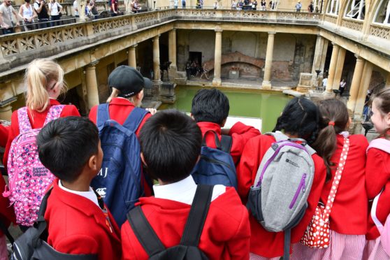 Elementary School Students at Roman Baths, Bath, England. (Photo by: Education Images/Universal Images Group via Getty Images)