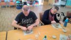 Hard at it: older people in Moray give pottery a go as part of an innovative new project.