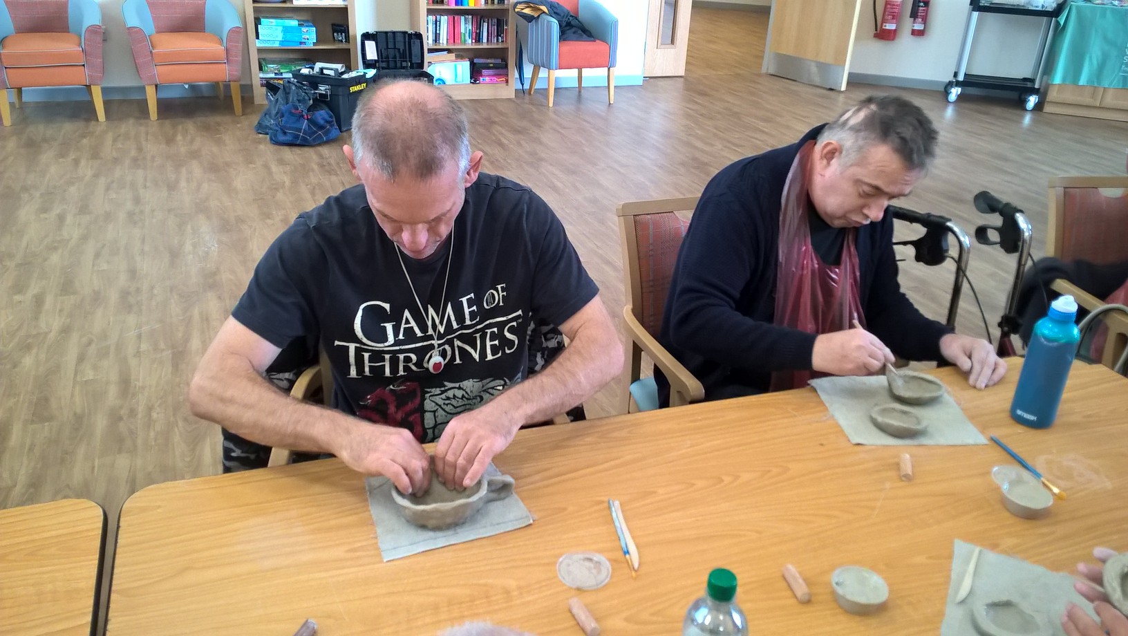 Hard at it: older people in Moray give pottery a go as part of an innovative new project.