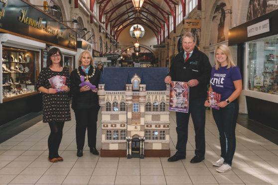 Jo Murray of Inverness Victorian Market,  and Provost Helen Carmichael pictured alongside the masterpiece with David Haas, Inverness City Manager and festival organiser Cecilia Grigor.