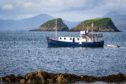 MV Monadhliath with the Shiants in the background. Picture courtesy of Paul Sharman