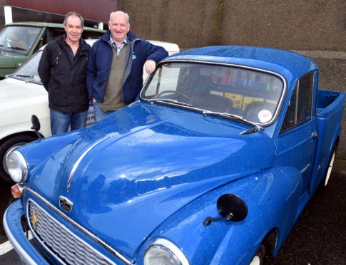 CR0014985
The annual Fraserburgh historic vehicle run from East to West starting from Fraserburgh.
Pictured from left are, Stephen Jappy and Jim McCue with an Austin Pickup.
Pic by...............Chris Sumner
Taken..............5/10/19