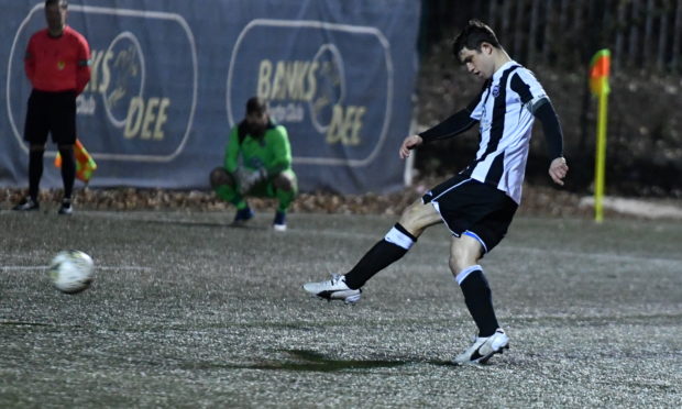 Fraserburgh's Willie West scores a penalty for the Broch.