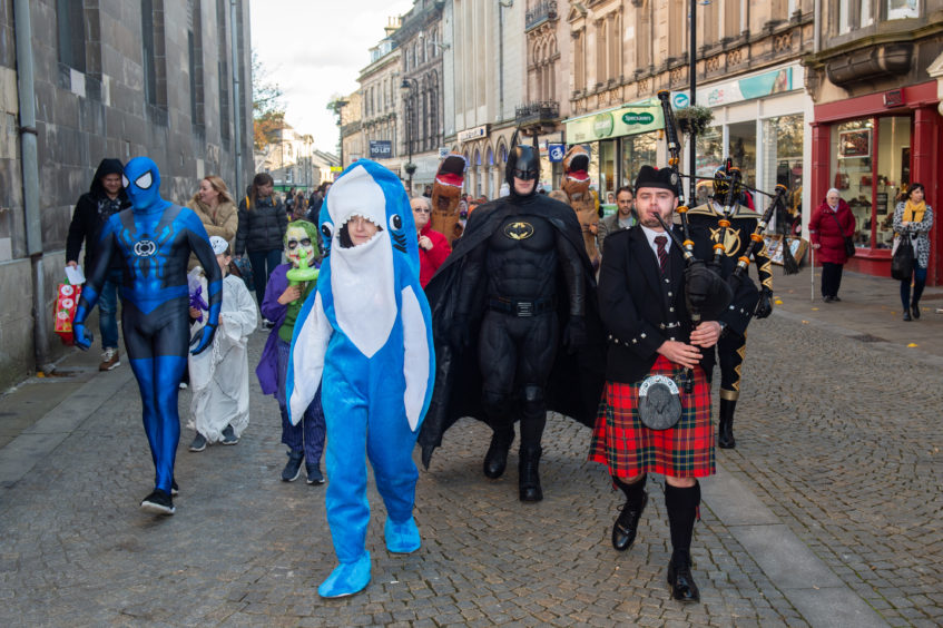 The parade goes through Elgin town centre. Picture by Jason Hedges.