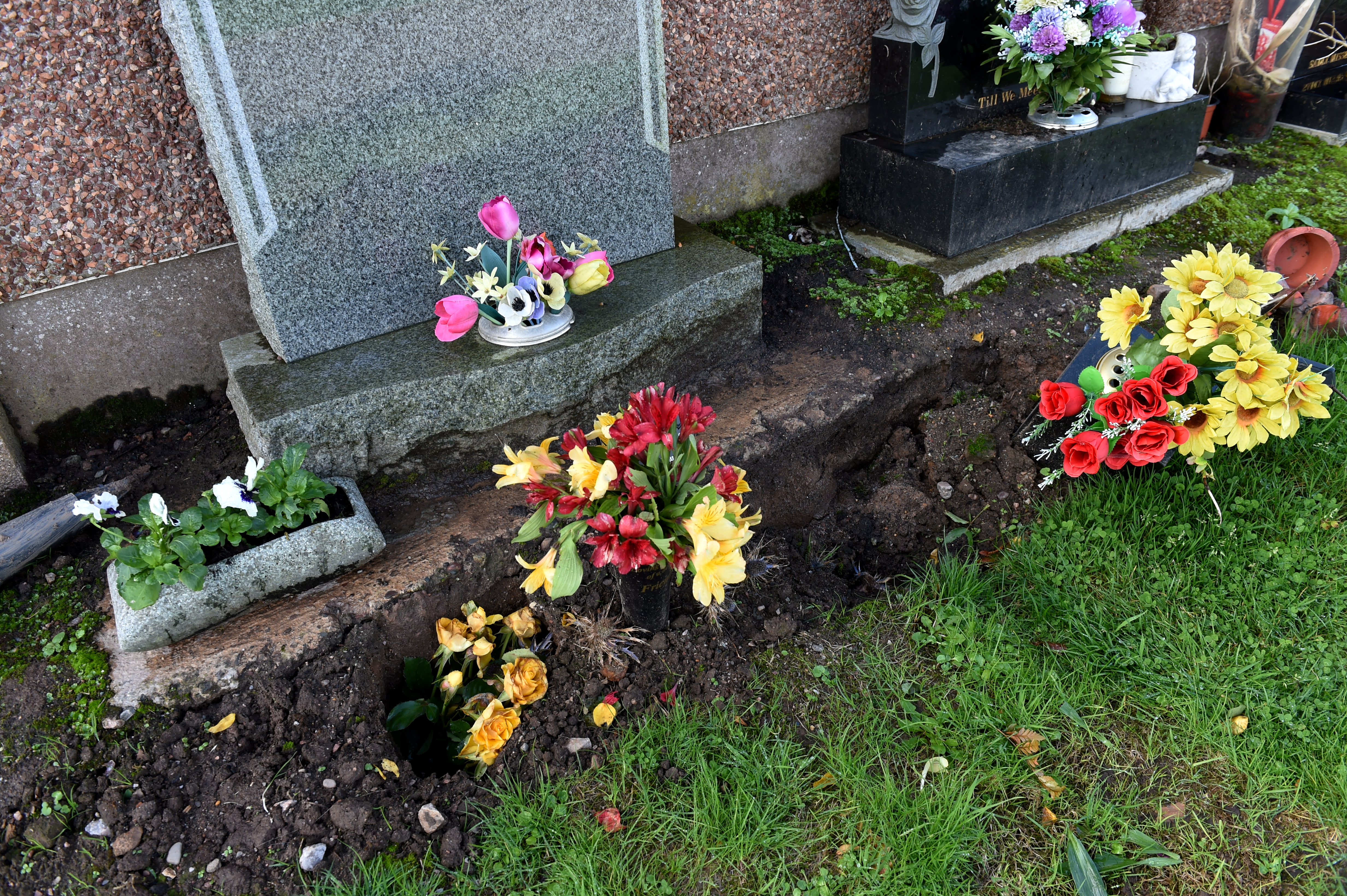Wilma Haggart noticed her son's grave is sinking at Grange Cemetery, Peterhead.

Picture by KENNY ELRICK