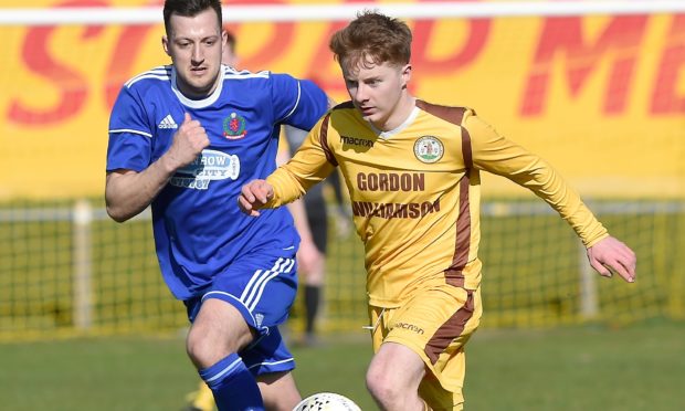 Andrew Macrae in action for Forres Mechanics.