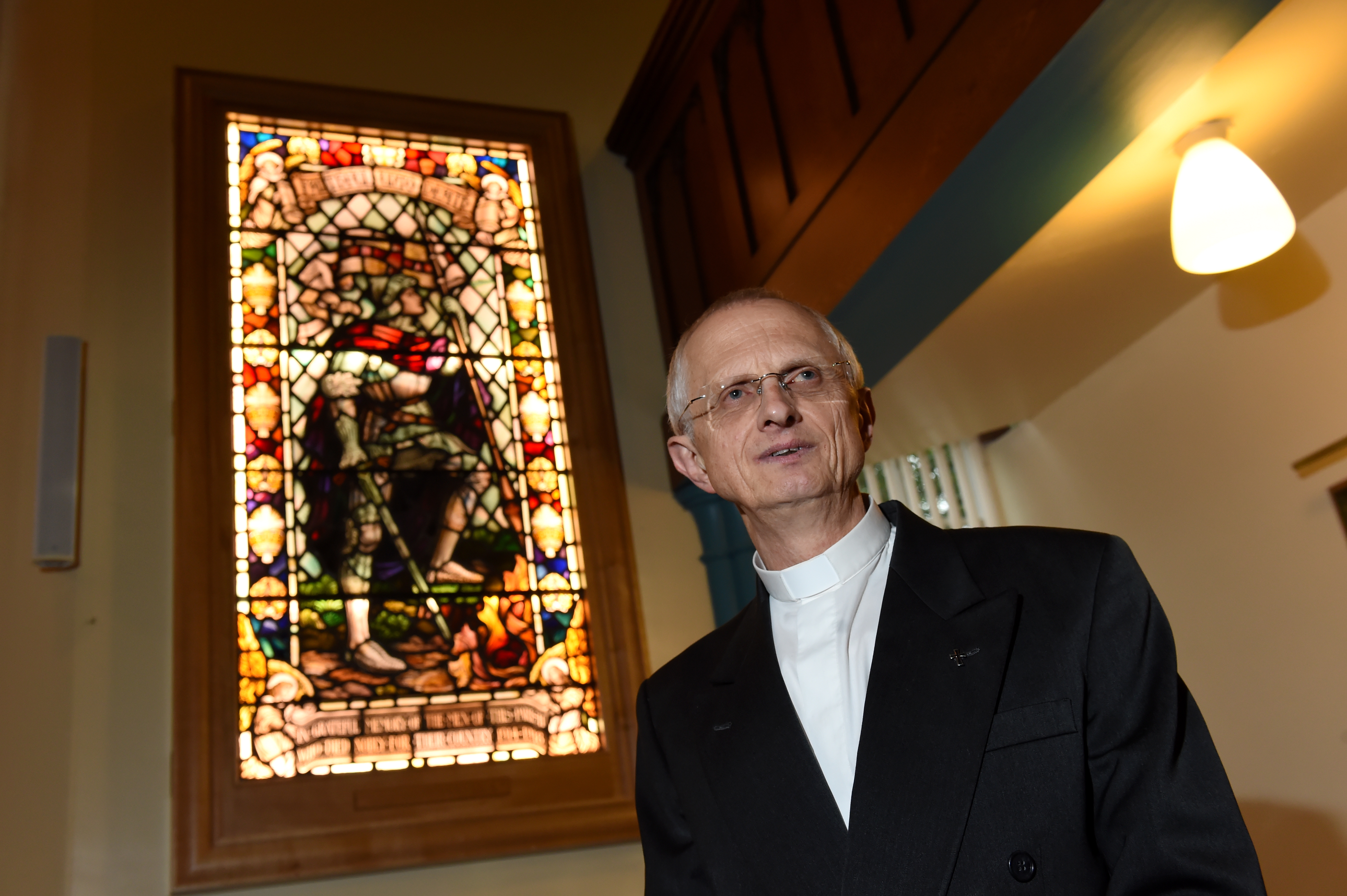 Rev Martyn Sanders held a rededication service for the stained glass window. Picture by Kenny Elrick.