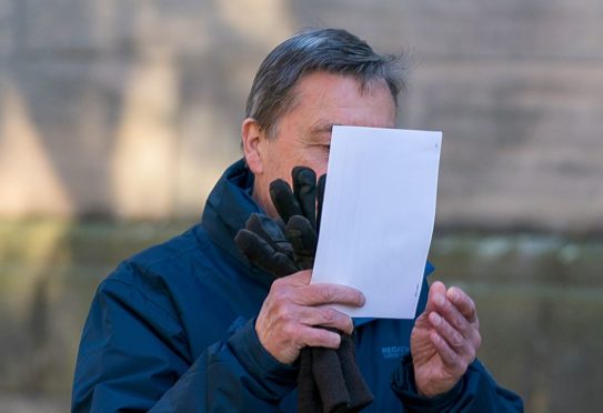 John Rouse leaving Elgin Sheriff Court.