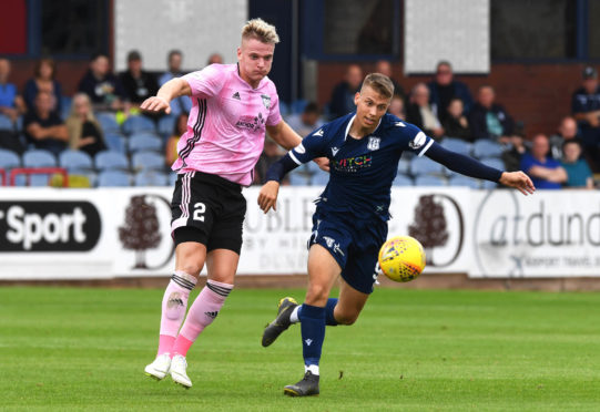 Peterhead defender Jason Brown (left).