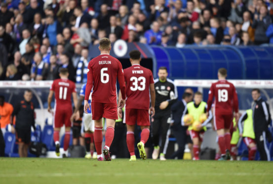 McInnes felt his side were lacking in experience and personality against Rangers.