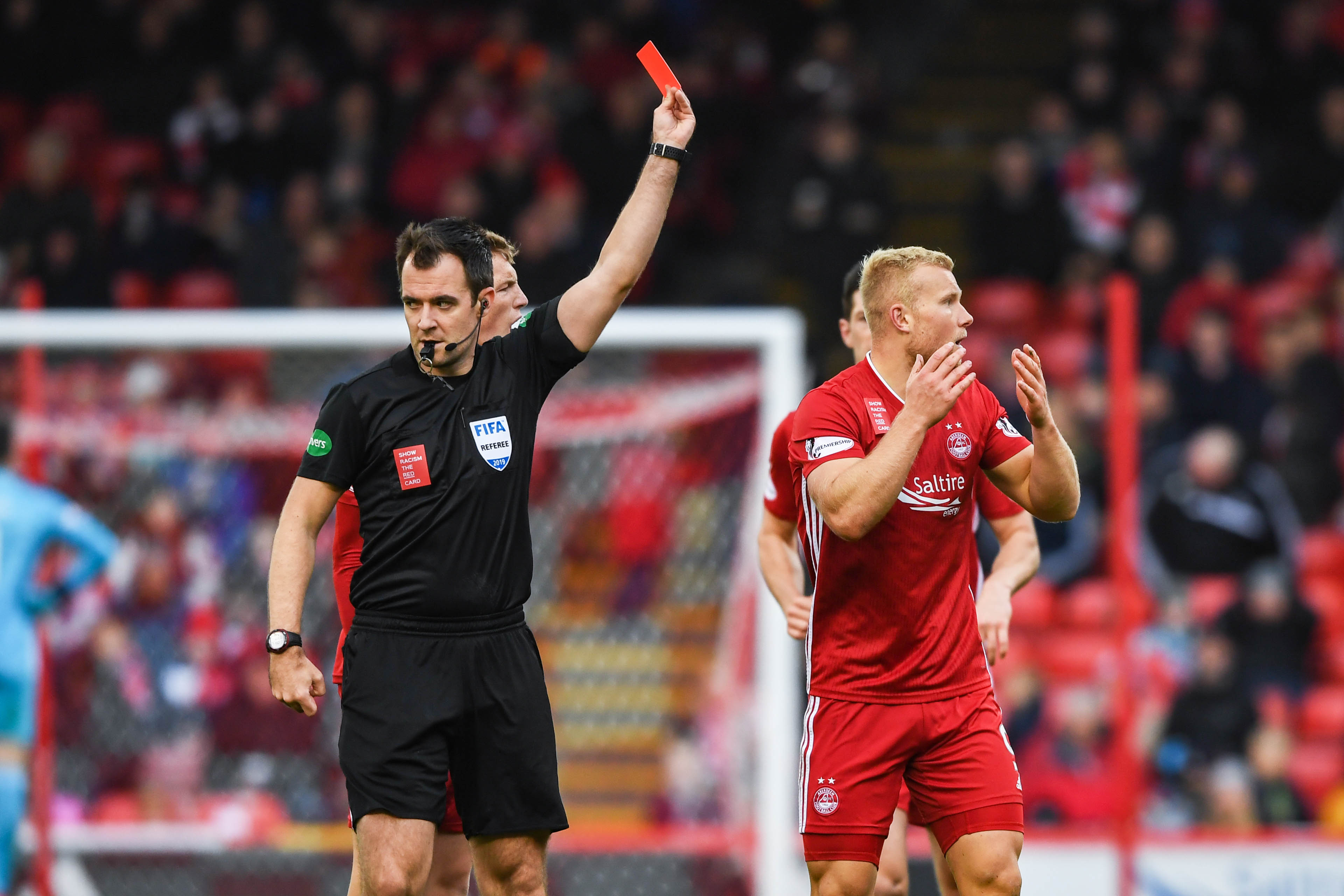 Aberdeen's Curtis Main (R) is sent off by referee Don Robertson during the Ladbrokes Premiership match between Aberdeen and Hibernian