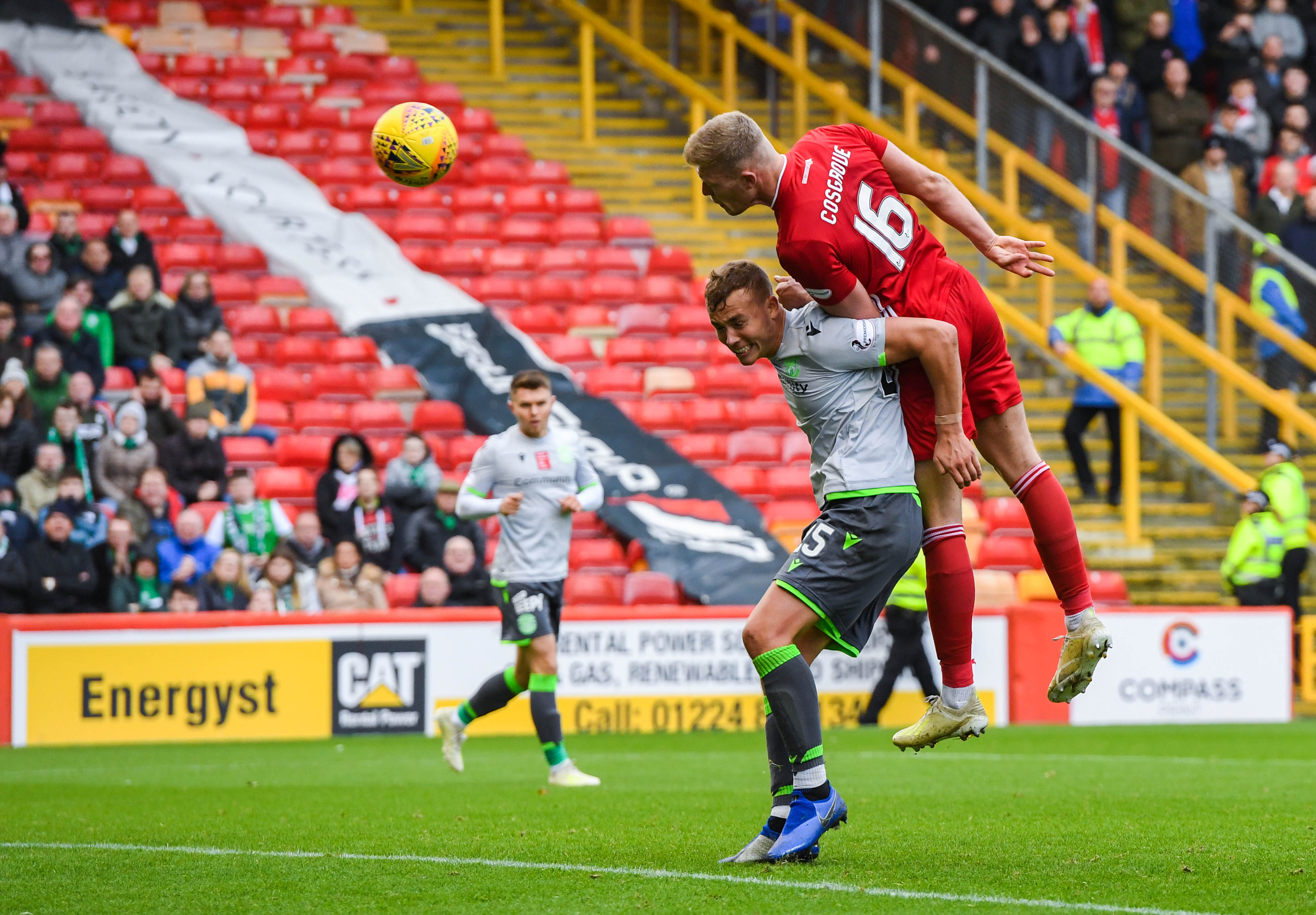 Aberdeen's Sam Cosgrove scores a header to make it 1-1 during the Ladbrokes Premiership match between Aberdeen and Hibernian at Pittodrie.