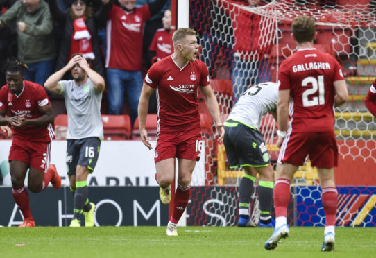 Sam Cosgrove celebrates his equaliser.