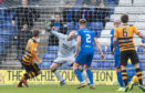Alloa's Alan Trouten (L) scores to make it 2-2 during the Ladbrokes Championship match between Inverness CT.