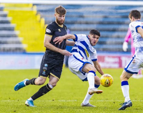 Shaun Rooney in action against Morton.